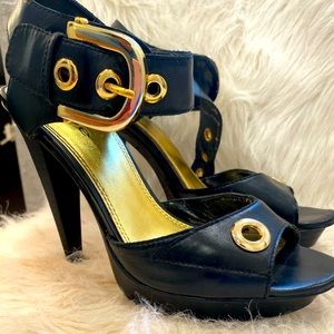 bebe Mimi black and gold platform heels